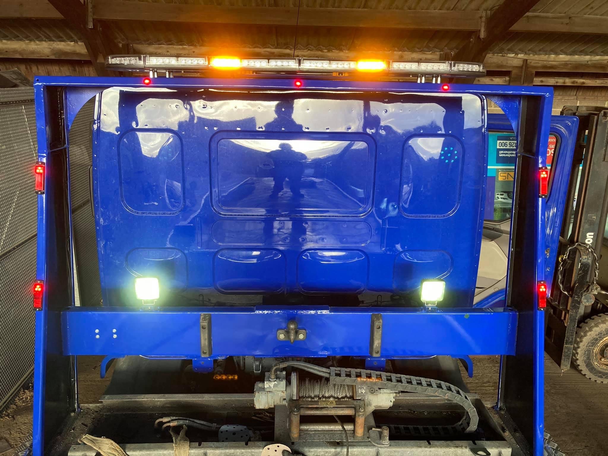 Van fitted with amber beacons and worklights